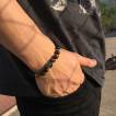 Bracelet homme en perles noires et Oeil de Tigre � croix