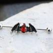 Piercing industriel à ailes de démon strass rouges rubis