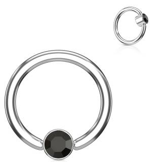 Anneau � cylindre captif serti d'un cristal noir