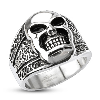 Bague homme acier � t�te de mort et reliefs tribaux