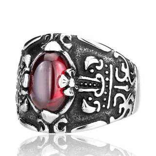 Bague homme gothique en acier � reliefs myst�rieux et pierre rouge ovale