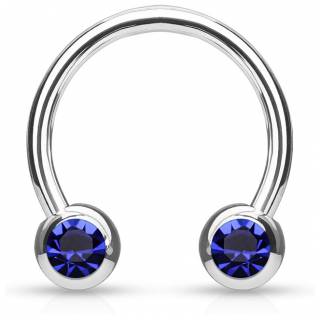 Piercing fer � cheval en acier serti deux cristaux bleus