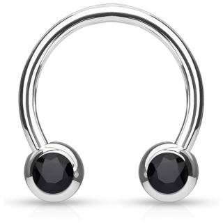 Piercing fer � cheval en acier serti deux cristaux noirs